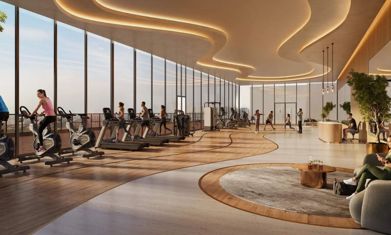 Global Riverfront - fitness studio with exercise bikes and treadmills along floor-to-ceiling windows